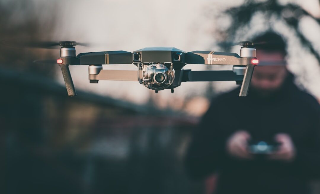 Operator piloting a drone for aerial reportage footage