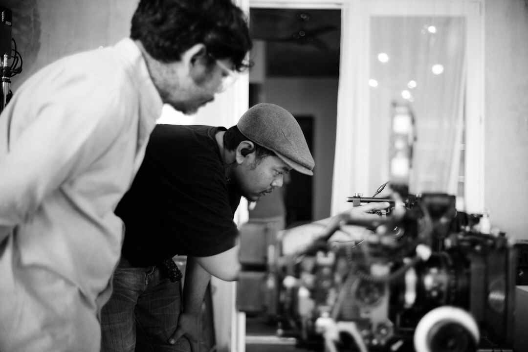 Client and producer reviewing a finished demonstration reel together