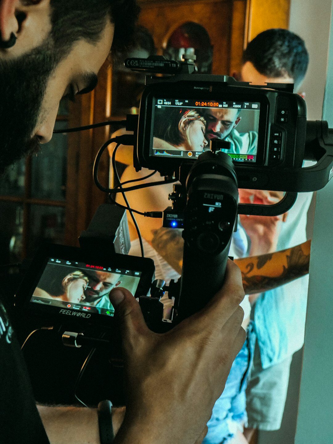 Journalist interviewing a person on camera during a reportage shoot
