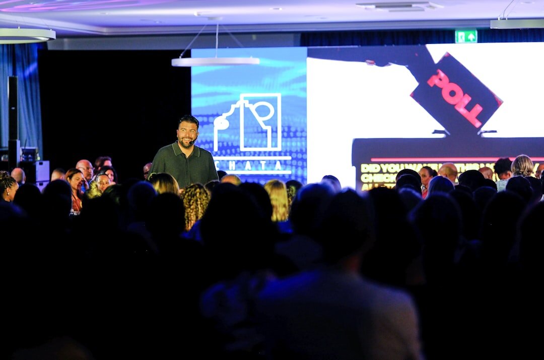 Videographer filming a corporate conference event